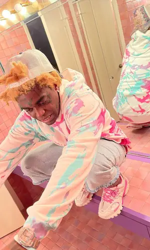 Kodak Black wearing Pale cap