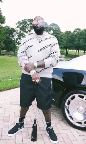 Rick Ross wearing Louis Vuitton eyewear