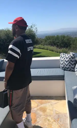 Mike Will Made-It wearing Nike sneakers