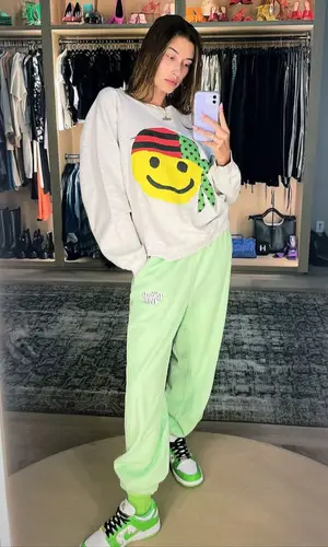 Hailey Bieber wearing Cactus Plant Flea Market sweatshirt