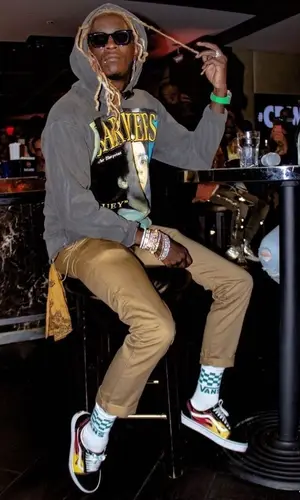 Young Thug wearing Vans sock