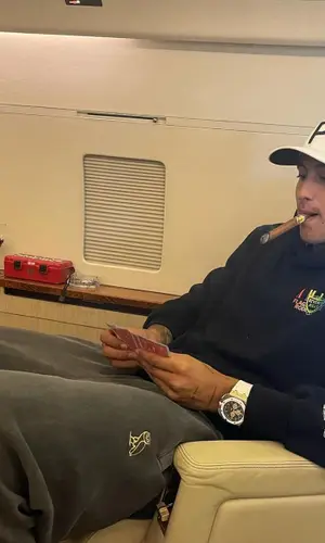 Kyle Kuzma wearing Puma cap