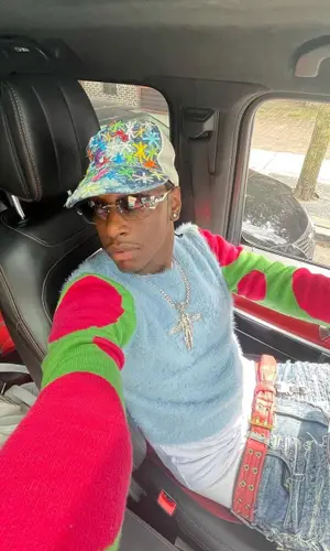 Bloody Osiris wearing Prada belt