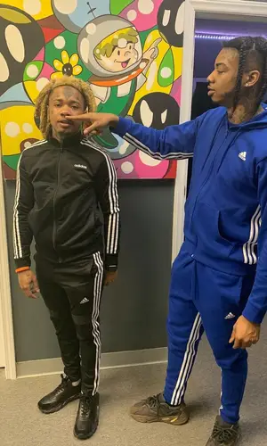 NGeeYL wearing Adidas pants
