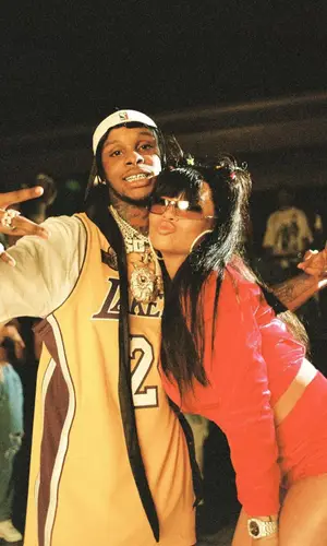 Toosii wearing Mitchell & Ness jersey