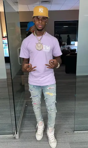 Toosii wearing Cartier eyewear