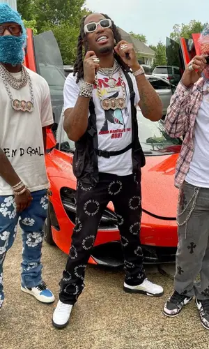 Offset wearing Louis Vuitton t-shirt