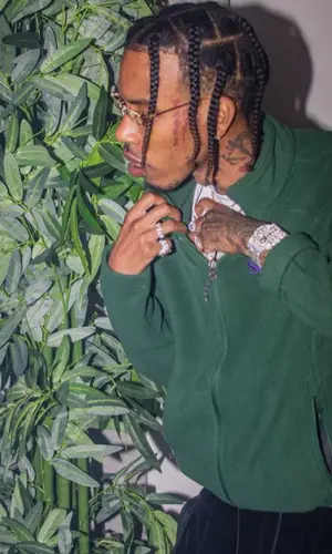 KSupreme wearing Cartier eyewear