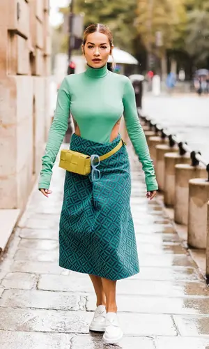 Rita Ora’s Outfit in Prada Boots, Bottega Veneta Bag & Linda Farrow Eyewear (2021)