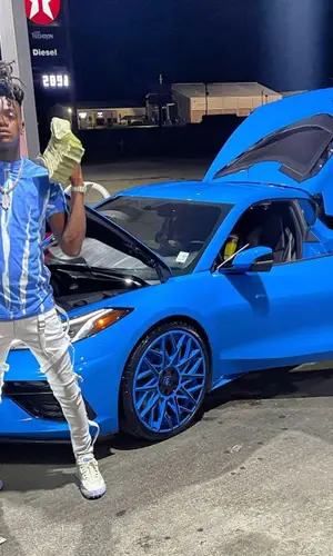 JayDaYoungan wearing Off-White sneakers