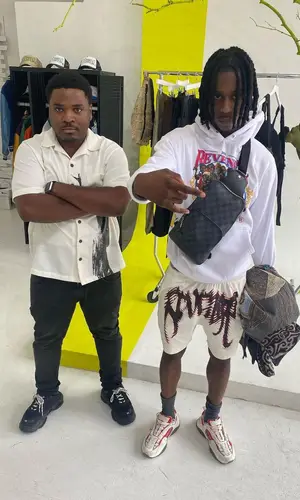 Polo G wearing Louis Vuitton bag