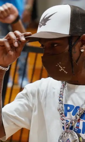 Travis Scott wearing Nike sneakers