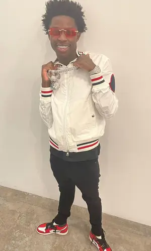 Quando Rondo wearing Moncler jacket