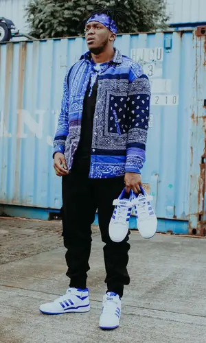 KSI wearing Marcelo Burlon County of Milan t-shirt
