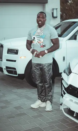 BandMan Kevo wearing Gucci pants