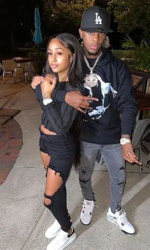 Toosii wearing Vlone hoody