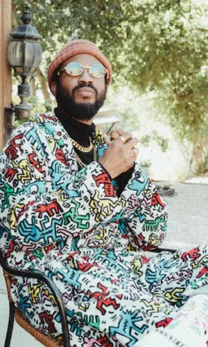 Lute wearing Keith Haring pants