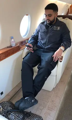Nav wearing Yeezy sneakers
