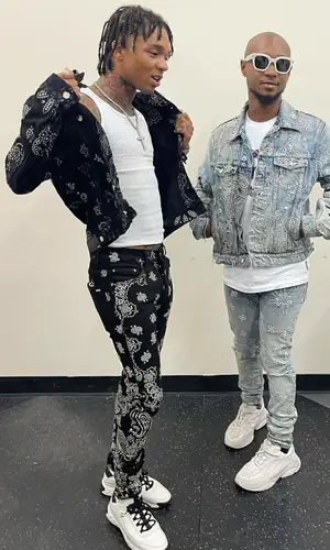 Slim Jxmmi wearing Amiri jeans