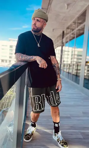 Nicky Jam wearing Rhude sock