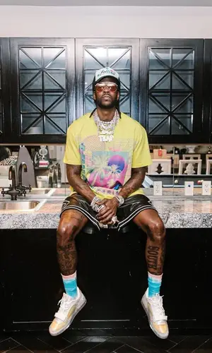2 Chainz wearing Amiri shorts