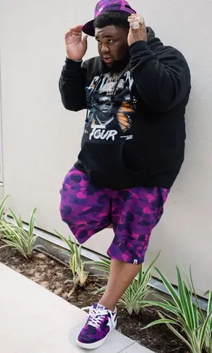 Rod Wave wearing Bape hat