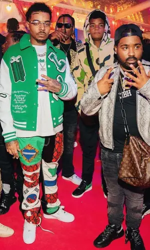 Wheezy wearing Nike sneakers