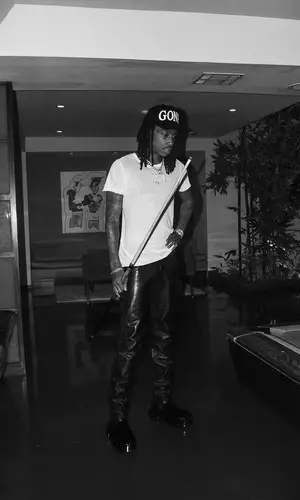 Wiz Khalifa wearing Rick Owens boots