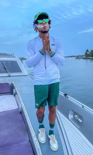 King Cid wearing Lacoste sock