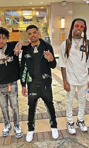No Cap wearing Amiri t-shirt