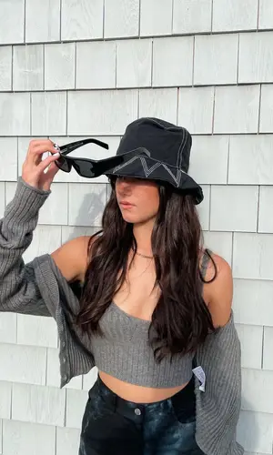 Charli D'Amelio wearing Prada boots