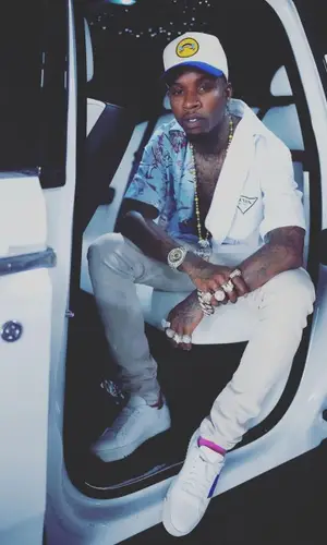 Tory Lanez wearing Amiri jeans