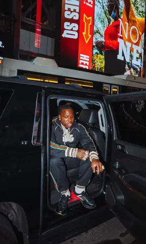 BandMan Kevo wearing Gucci jacket