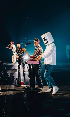 Marshmello wearing Nike sneakers