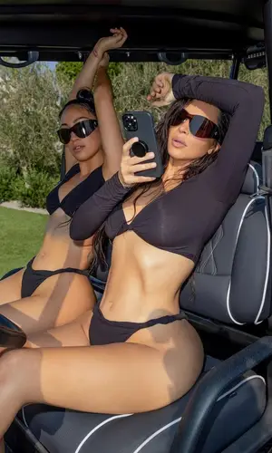 Kim Kardashian wearing Skims swimwear