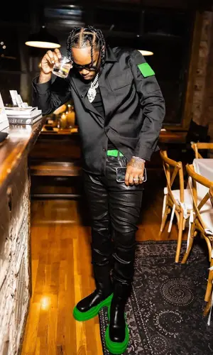 Fivio Foreign wearing Bottega Veneta boots