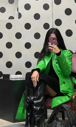 Dua Lipa wearing Jimmy Choo boots