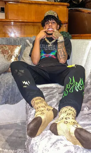 King Cid wearing Gucci sock