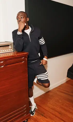 Bobby Shmurda wearing Thom Browne shorts