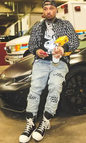 Doe Boy wearing Amiri cap