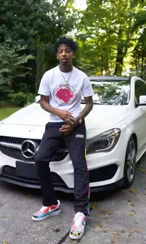 21 Savage wearing Loewe t-shirt