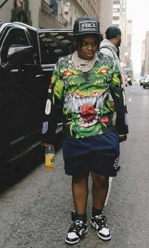 42 Dugg wearing Chrome Hearts cap