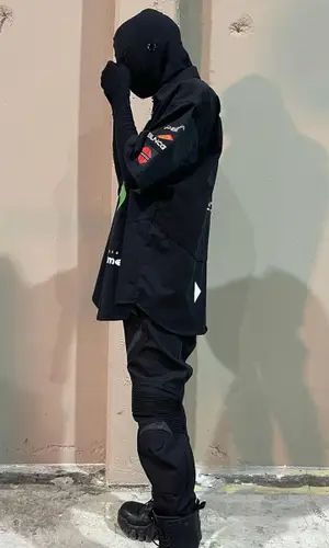 Playboi Carti wearing Balenciaga boots