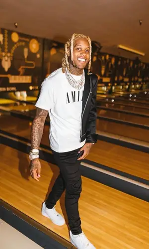 Lil Durk wearing Amiri t-shirt