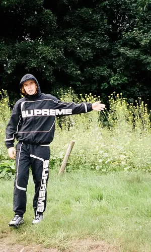 The Kid Laroi’s Outfit in Supreme Jacket & Nike Sneakers (2021)