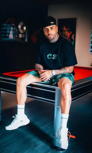 Nicky Jam wearing Balenciaga sock
