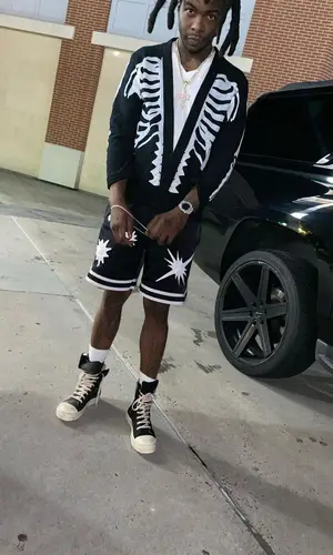 Yak Gotti wearing Billionaire Boys Club shorts