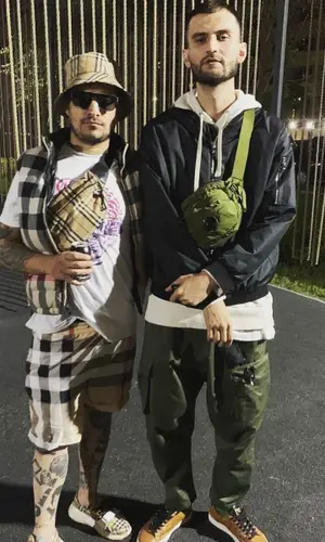 Паша Техник wearing Burberry bag