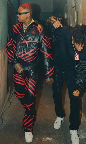 YG wearing Formy Studio jacket