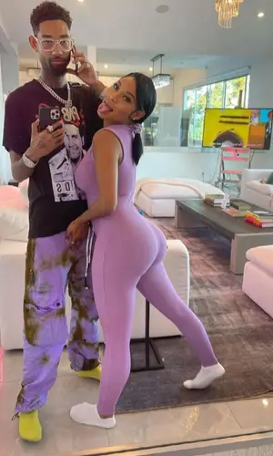 PnB Rock wearing Palm Angels trousers
